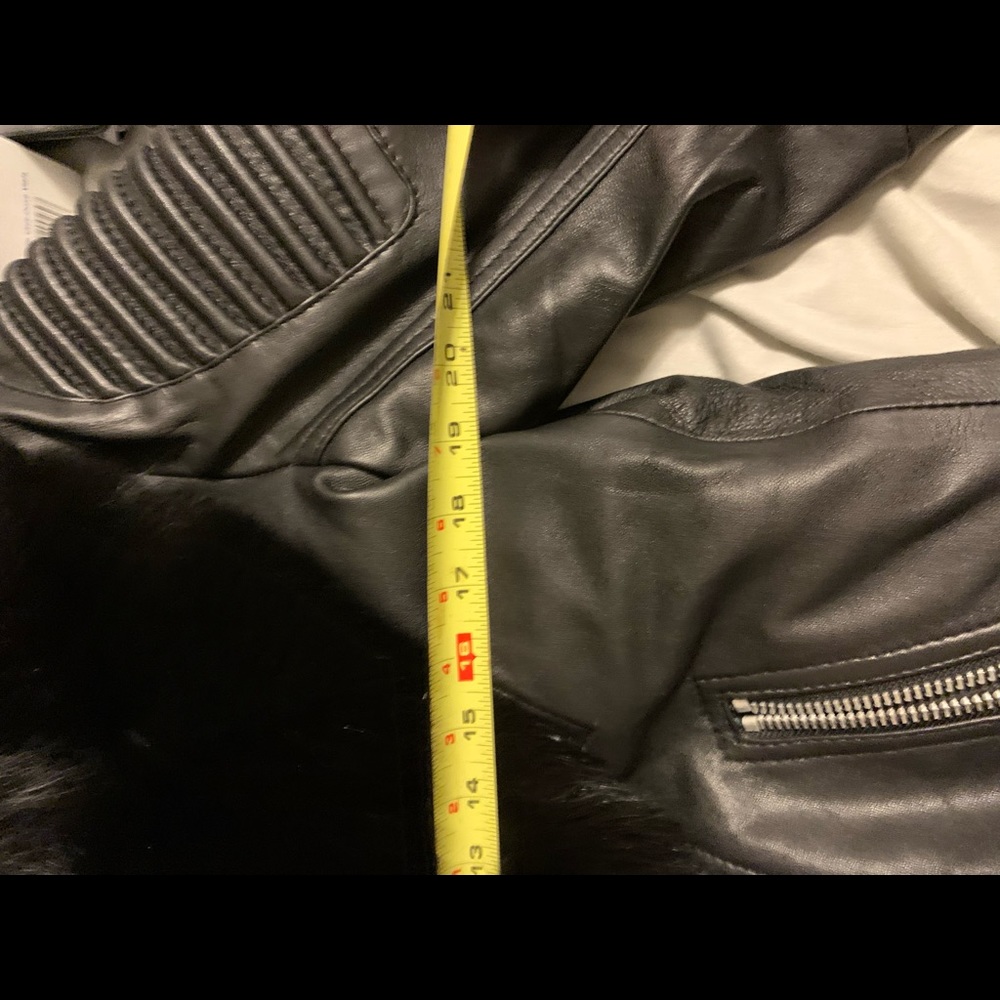Men’s black leather and mink biker jacket. Tagged XL but fits more like a large.